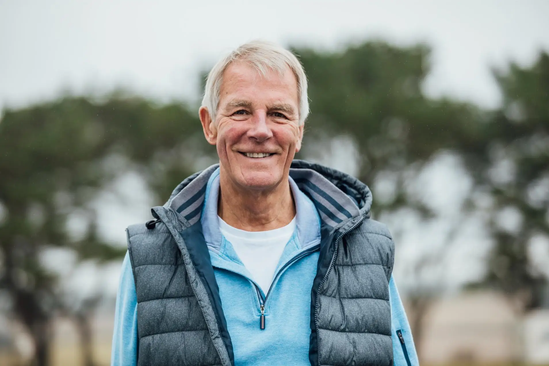 mature man smiling at the camera